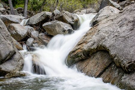 I am glad to take this amazing shot at the amazing Yosemite National Park. The movement of water shows the contrast of quiet and dynamic.の写真素材