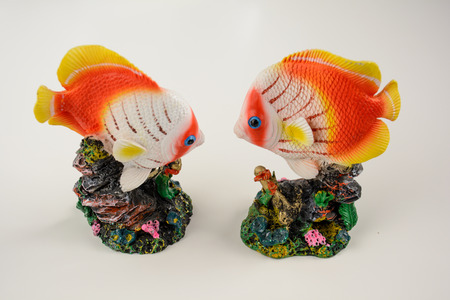 Light Room Shooting of Colorful handicraft Golden Fish Statueの写真素材