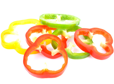 Bell pepper slices on white backgroundの写真素材
