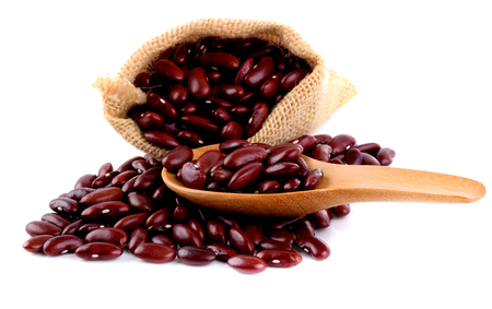 red beans in spoon on white backgroundの写真素材