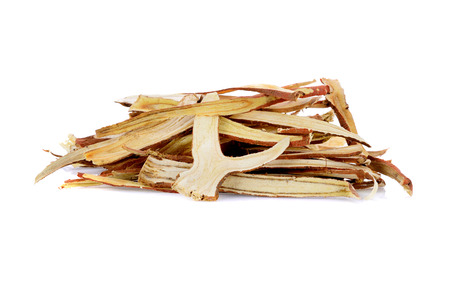 dried Liquorice roots isolated on white backgroundの写真素材