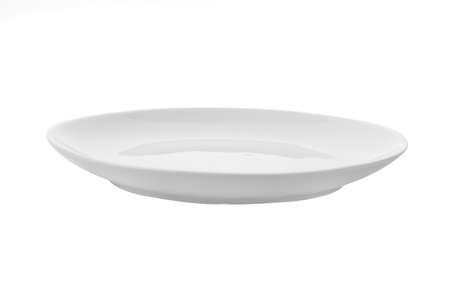Empty white plate isolated on a white backgroundの写真素材
