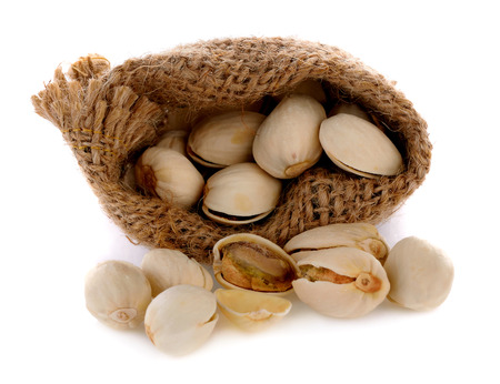 Pistachio nuts isolated in bagの写真素材
