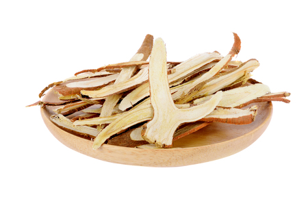 dried Liquorice roots isolated on white backgroundの写真素材