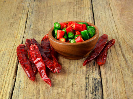 slice green hot chili  and drychili  on woodの写真素材