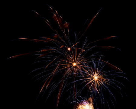 Fireworks explosions against black night skyの写真素材