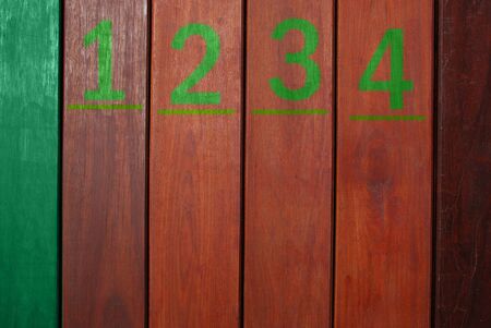 Wooden background with spray numberの写真素材