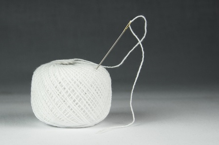 White spool of threadの写真素材