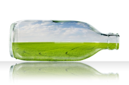Rice field on blue sky in glass bottleの写真素材