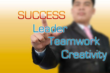 Businessman pressing on Success  の写真素材