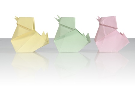 origami chicken from paper on white backgroundの写真素材