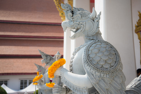 Flower on hand of Thai style sculpture art  の写真素材