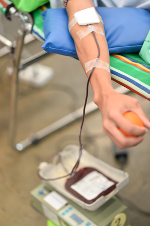 Man giving blood donationの写真素材