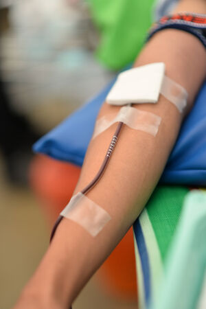 Man giving blood donationの写真素材