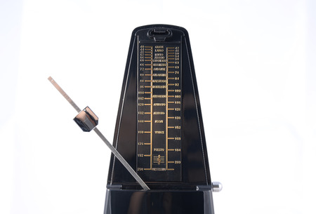 Metronome isolated on white の写真素材