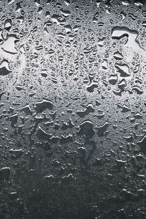 Behind the dark black is water dropの写真素材