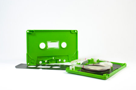 parts of cassette tape on white background