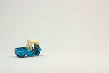 tricycle toyÂ worthless on white background