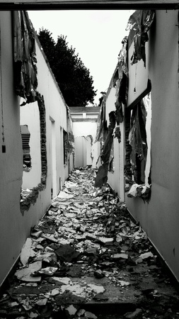 Bricks wall destroyed black and white.の素材