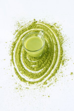 A Cup of Green Tea Latte with green tea powderの写真素材