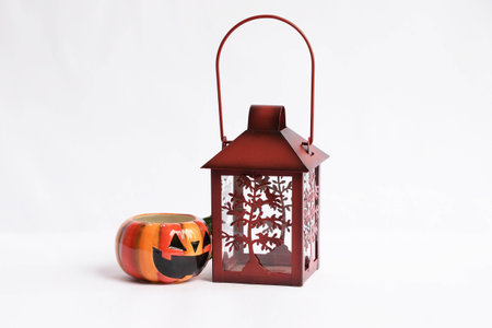 vintage lamp, lantern with Halloween glass on white backgroundの写真素材