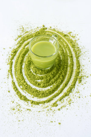 A Cup of Green Tea Latte with green tea powderの写真素材