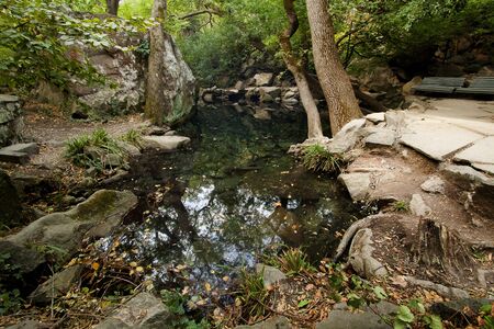 small pond betweens the stones and woods in Vorontsovsky park, Alupkaの写真素材