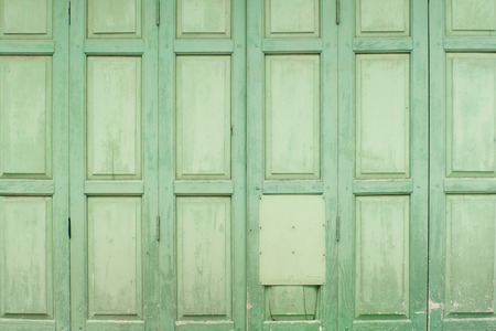 Aqua green wooden door textureの写真素材