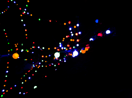 Colorful light bulb in circle shape in the dark.Abstract backgroundの写真素材