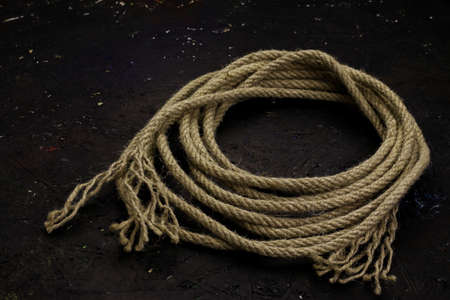 Rope close up on dark background.