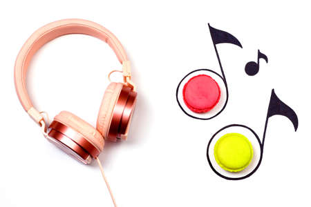 Sweet music creative background. Macaroon and hand drawn music notes  on white backgroundの写真素材