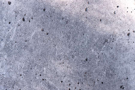 Natural porous stone background. Black and white stones texture.の写真素材
