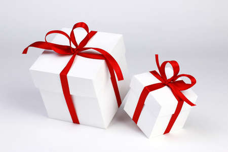 Little white gift box and big gift box on light blurred background. Part of set.の写真素材