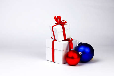 Gift boxes and Christmas tree toy balls. New Year and Christmas holydays concept. Part of set.の写真素材