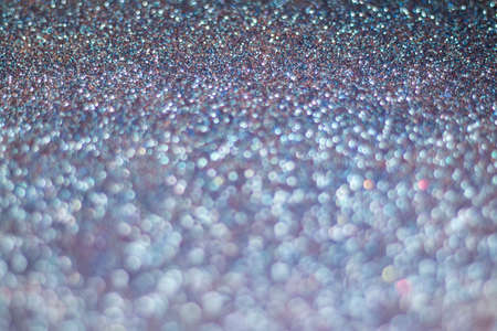 Vintage style silver abstract background with selective focus and bokeh. Retro style sparkling and shine backgroundの写真素材