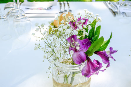 <p>Decoration with wild flowers in an outdoor celebration.</p>
