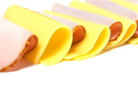 meat and cheese slices isolated on whiteの写真素材