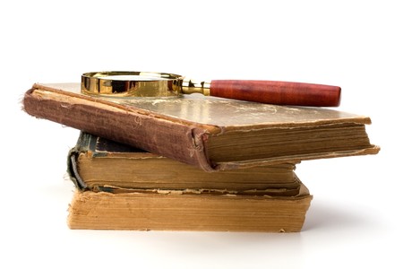 tattered book stack isolated on white backgroundの写真素材