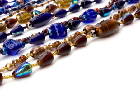 colourful beads background on white