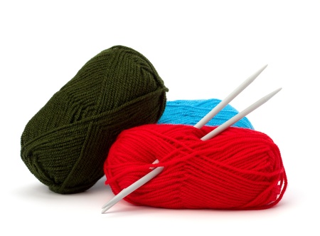 Woollen thread and knitting needle. Needlework accessories isolated on white background.