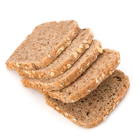 Healthy bran bread slices with rolled oats isolated on white background