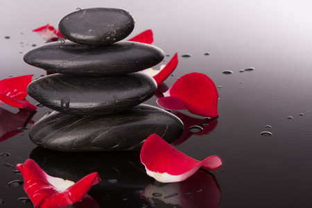 Spa stone and flower petal still life. Healthcare concept.の写真素材