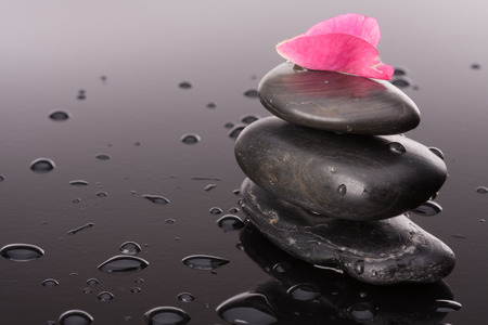 Spa stone and rose flowers still life. Healthcare concept.の写真素材