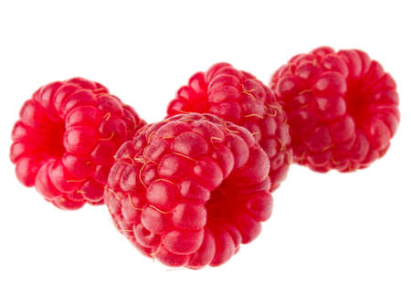 ripe raspberries isolated on white background close up
