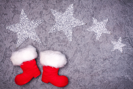 Christmas greeting card. Noel festive background. New year symbol. Santas shoes.の写真素材