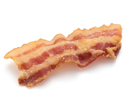 cooked crispy slice of bacon isolated on white backgroundの写真素材