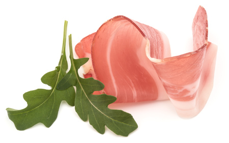 Italian prosciutto crudo or jamon. Raw ham. Isolated on white backgroundの写真素材
