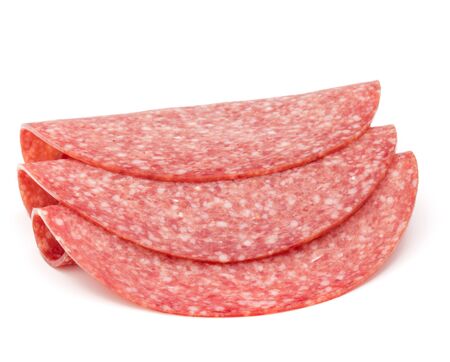 Salami smoked sausage slices isolated on white backgroundの写真素材