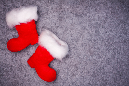Christmas greeting card. Noel festive background. New year symbol. Santas shoes.. Copy space to your text.の写真素材