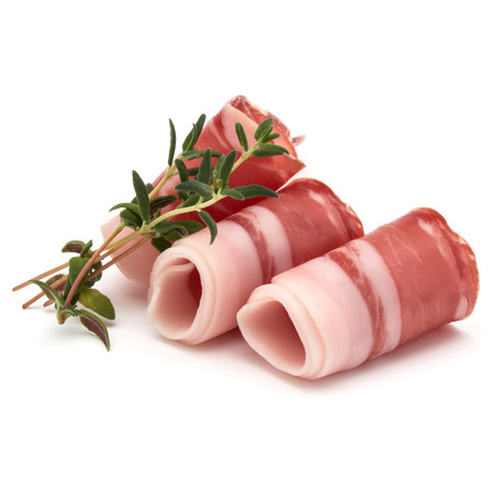 Italian prosciutto crudo or jamon. Raw ham. Isolated on white backgroundの写真素材